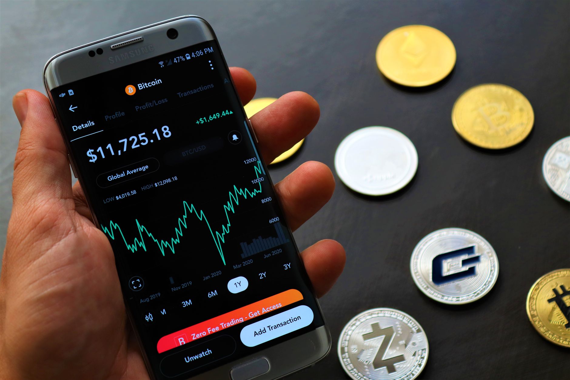 a person looking at a cryptocurrency wallet app on a smartphone